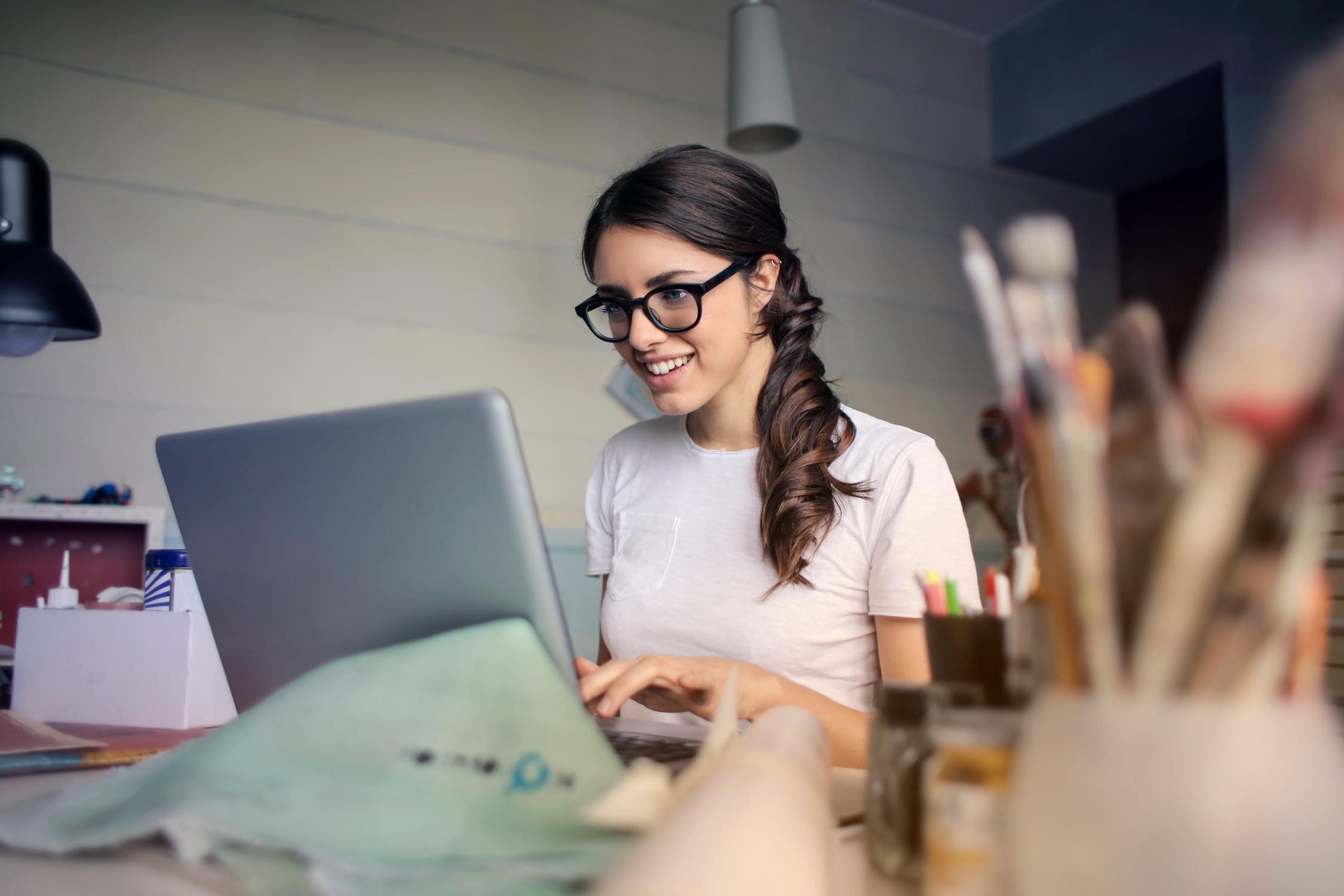 girl typing on a computer